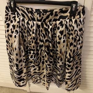 White House Black Market skirt. Size 4 with animal print